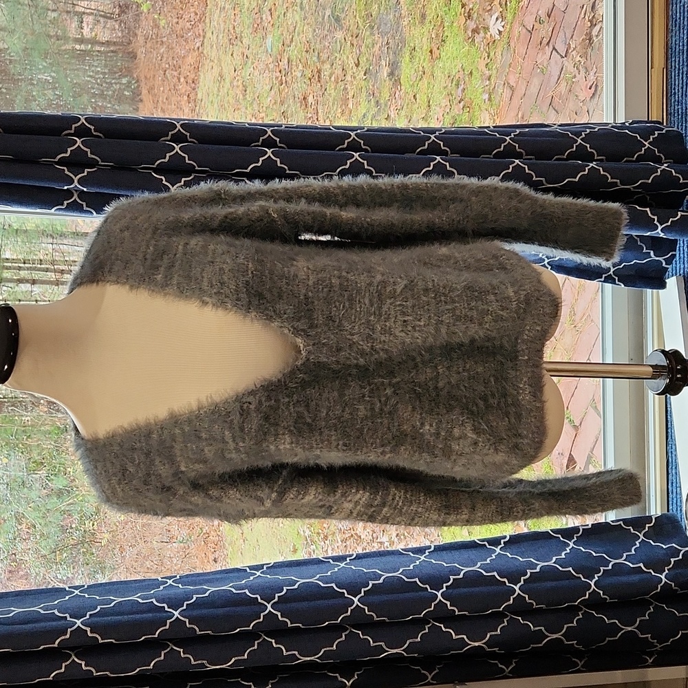 Free People Storm Combo deep v-neck sweater; made of 100% Polyamide
